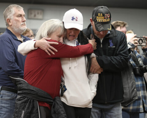 Suspect in shooting of National Guard members faces murder charge as US halts all asylum decisions